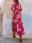 Bedrucktes Maxikleid mit V-Ausschnitt, Puffärmeln und Schlitz